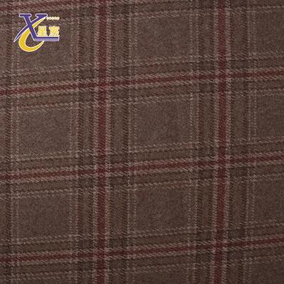 China Xingchen spandex jacquard plaid check apparel brown elastic single material dress viable garment poly spandex jacquard fabric for sale