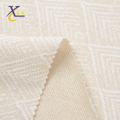 China Other High Grade Polyester Spandex Fancy Jacquard Knitted Dubai Dress Bright Gold Fabric for sale