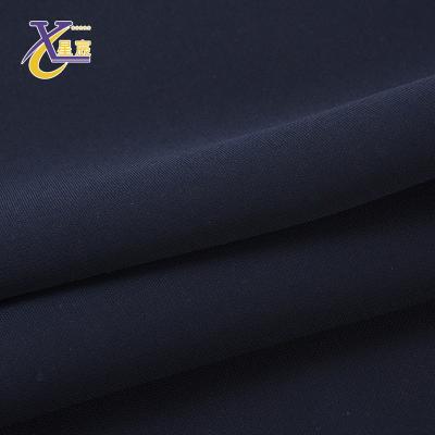 China Other high quality colorful solid 100% polyester woven dress fabric from Xingchen stocklot factory for sale