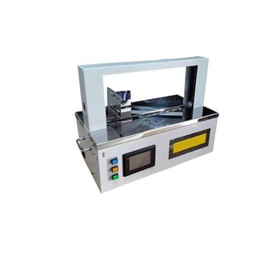 China Mini small money / food paper assembling strapping machine and opp band machine for 20 mm and 30 mm width for sale