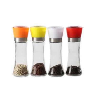 China Sustainable Colored Glass Spice Grinder Bottle With Plastic Lid for sale