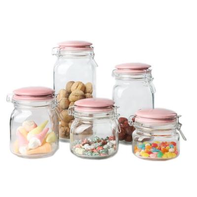 China Sustainable Square Glass Staple Storage Jars With Sealed Ceramic Lids for sale