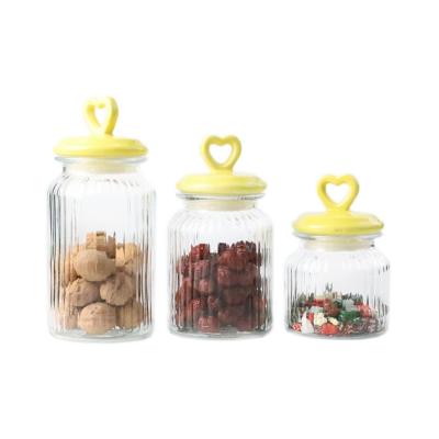 China Sustainable glass storage jar with special ceramic lid for sale