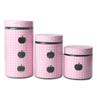 China 3 viable round glass candy canisters with apple holes and pink metal covers for sale