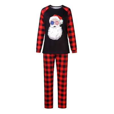 China QUICK DRY Pajamas Parent Child Gear Kids Pajamas Santa Print Pajamas Fashionable Warm Amazon Family Pajamas Autumn And Winter New Christmas for sale