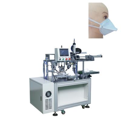 China Dust Environment Easy-to-operate Horizontal Folding Detachable Respirator Mask Welding Machine for sale