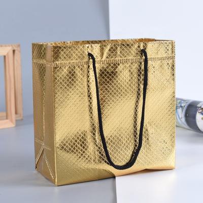 China Gold Color Handled Tote Bag Foldable With Rope Nonwoven Handle for sale