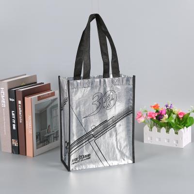 China 2022 Hot Sale Reusable Silver Handled Non Woven Candy Packaging Bag for sale