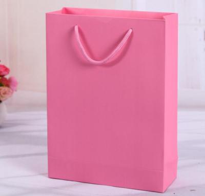 China Eco Friendly Wholesale Color Promotional Rose Art Printed Paper Gift Bags for sale