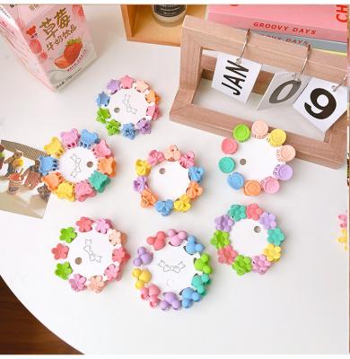 China New Design Hair Accessories Small Candy Color Mini Hair Claw Colorful Five-pointed Star Bear Flower Hair Clips For Girls Accessories for sale