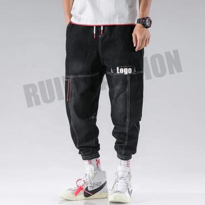 China Fashionable Breathable Streetwear Hip Hop Cargo Pants Men's Jeans Elastic Joggers Autumn And Spring Men Clothing for sale