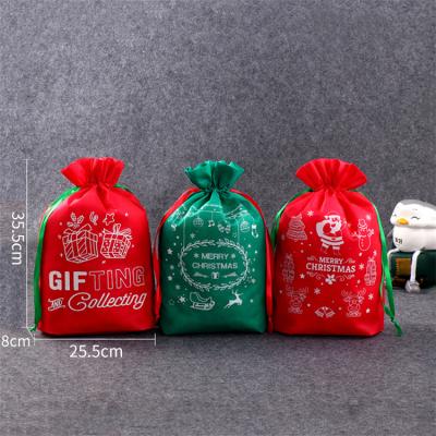 China Lucky Non-woven Apple Drawstring Christmas Gift Bag for sale