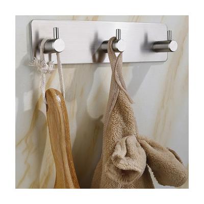 China Viable 3 Hooks Towel Robe Hooks Racks Bedroom Cloth Coat Hanger For Self Adhesive Bathroom Kitchen for sale