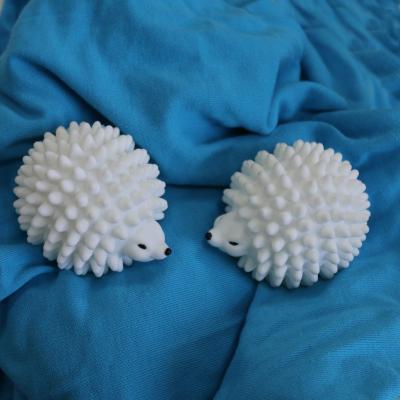 China Oblong Pink Plastic Wash Ball Dryer Ball Hedgehog Wash Ball for sale