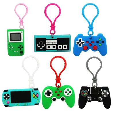 China Cute car key charms women men keyholder fashion PVC cartoon game controllers key chain eco-friendly creative fun game grip handle for sale