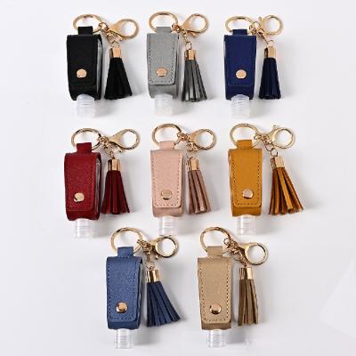 China Multi Color Travel Size Bottle Holder PU Sanitizer Holder Tassel Key Chain Eco-friendly Leather Waterless Portable Hand Sanitizer Holder for sale