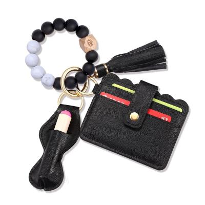 China Eco-Friendly Key Chain Bracelet Bangle Key Wallet, Silicone Bead Keychain Bracelet For Women for sale