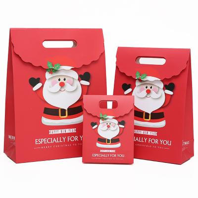 China 2021 Cute Cartoon Party Design Merry Christmas Themed Paper Gifts Candy Recyclable Packing Packaging Bags For Christmas Gift for sale