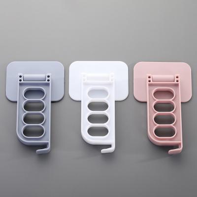 China Creative Seamless Punch-free Adhesive Organizer Bathroom Storage Modern New Fashion Hook Balcony Drying Storage Hanger for sale