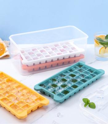 China Sustainable Household Silicone Frozen Ice Tub Magic Ice Cube Tray Mold With Storage Box for sale