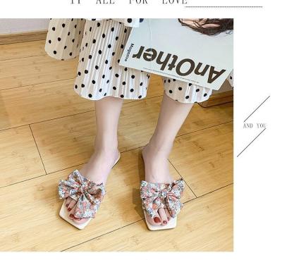 China New Massage Slides Women Slippers Summer Outdoor Beach Shoes Fashion Brand Woman Slippers Bowknot Female Sandals for sale