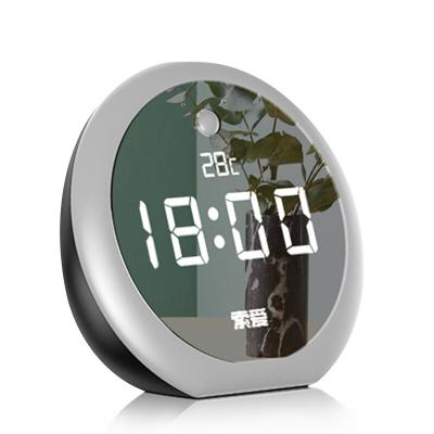 China Wireless Alarm Clock Mini Wireless Smart Speaker Make Touch E19 Button Up Mirror With LED HD Display Screen for sale