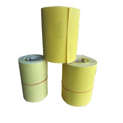 China Sharp Yellow Aluminum Oxide Sandpaper Sandpaper Roll 115mm*25m Sanding Grit 120 For Diy Market / Home Decoration for sale