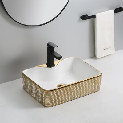 China Wholesale Outdoor Electeoplate Rectangle Hotel Over Counter Bathroom Sink Single Hole Gold Bathroom Ceramic Wash Basin for sale