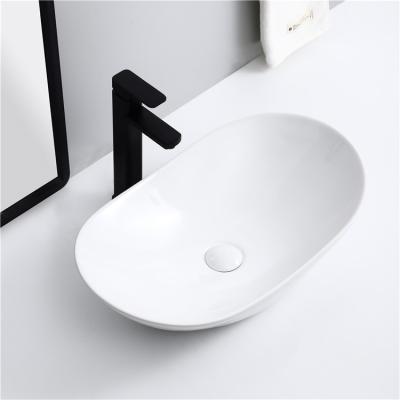 China Modern High Quality Sanitary Ware Italian Oval Basin Hotel Bathroom Hotel Bathroom Ceramic Basin Counter Top Ceramic Sink China Ware for sale