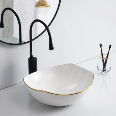 China Easy Clean Hotel Modern Luxury Gold Bathroom Vanity Vanity Sink Arc Countertop Wash Basin Gold Ceramic Sink for sale