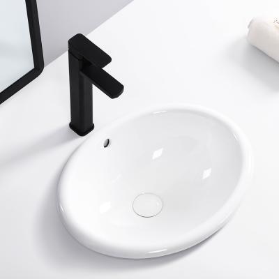 China Modern Luxury Sanitary Ware Bathroom Oval Shape Porcelain Bathroom Sink Sinks White Ceramic Hand Sink for sale