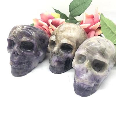 China China Wholesale Natural Healing Quartz Dreamy Amethyst Polishing Crystal Skulls Hand Carving Crafts for sale