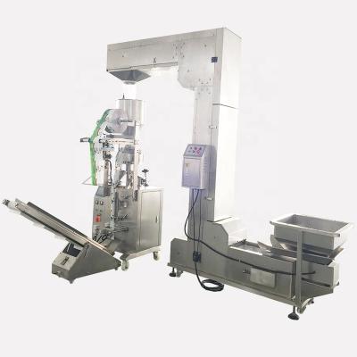 China 320A Automatic Food Sunflower Seed Packaging Machine With Z Type Conveyor ,Cheap Price Snack Food Packing Machine for sale