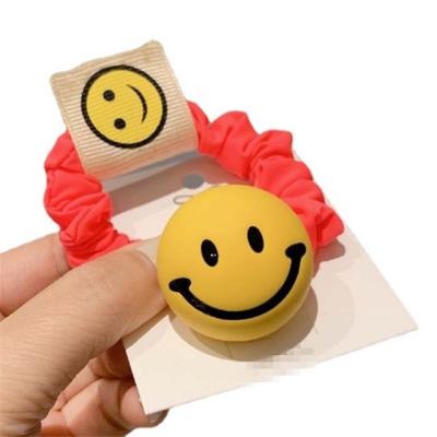 China Fashion Colorful Cute Frosted Adult Hair Rope Of A Circle Yellow Smiling Children Hair DIY Jewelry Accessory Elastic Face Band for sale