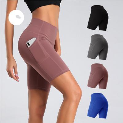 China Anti-Wrinkle Biker Shorts With Pockets Solid Summer Women Jogging Shorts Gym Tights Sport Running Quick Dry Shorts for sale