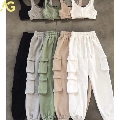 China QUICK DRY custom embroidery knit women apparel two piece set jogger with pockets and crop top vest set for sale