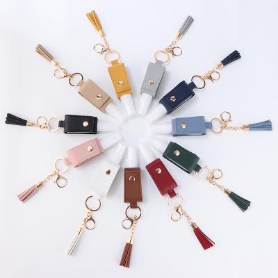 China 30ml Sanitizer Pet Bottle Keychain PU Cover Spray Travel Bottle Bag Creative Portable Leather Pendant Fashion And Tassel Key Chain For Personal Care for sale