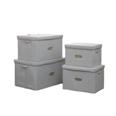 China Modern Daily Necessities Printing 600D Polyester Oxford Cloth Double Divider Folding Canvas Cube Storage Box For Cloth With Lid for sale