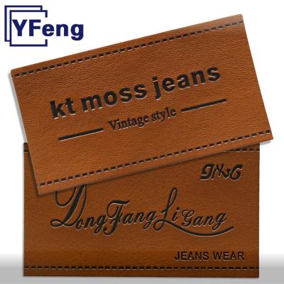 China Free Sample Cloth Faux Emboss Synthetic LOGO Custom Jeans Washable Iron On Garment Label Tag Leatherette Leather Patch for sale