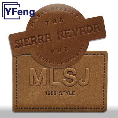 China Distinctive Viable Customize LOGO Iron On Clothes Hat Print Emboss Laser Deboss Genuine Leather Label Tag Patch for sale