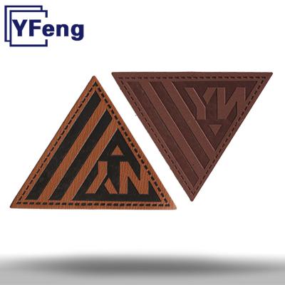 China Viable Name LOGO Heat transfer hat jeans free laser Deboss emboss print tag leatherette patch label for sale