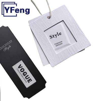 China Other Brand LOGO Emboss Printing Clothing Garment Gift Certificate Craft Paper Cardboard Swing Luxury Hangtag With String for sale