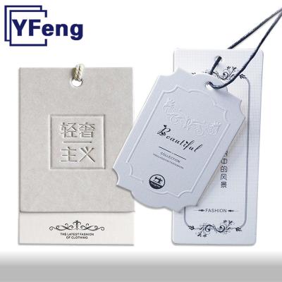 China High Quality Viable Brand LOGO Emboss Printing Clothing Garment Gift Voucher Wrapping Craft Paper Cardboard Swing Hang Tag With String for sale