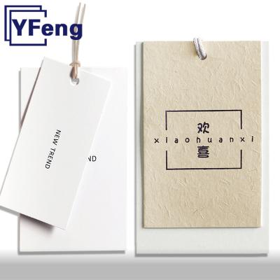 China Fashion Brand LOGO Emboss Printing Clothing Garment Gift Voucher Kraft Paper Craft Cardboard Swing Viable Tag With String for sale