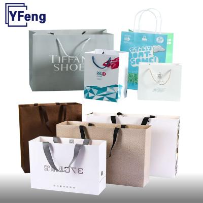 China Hot Stamping Food Grade Best Price Deboss Print Customized Logo Wedding Universal Food Cardboard White Kraft Paper Bag With Handle for sale