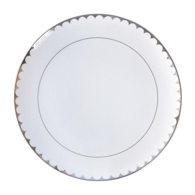 China Sustainable Elegant New Design Silver Rim Round Charger White Ceramic Cheap Plate For Wedding for sale