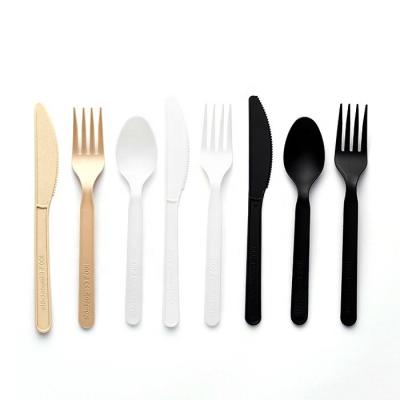 China 100% PLA Plastic Disposable Biodegradable Biodegradable Flatware Set Cutlery Set Spoon Fork Knife Flatware Set for sale