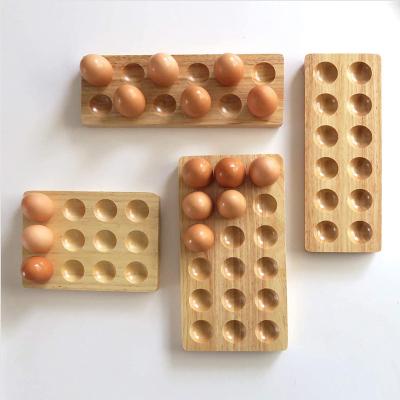 China Europe 12 Grid Egg Storage Rack Wooden Kitchen Countertops Egg Rack for sale