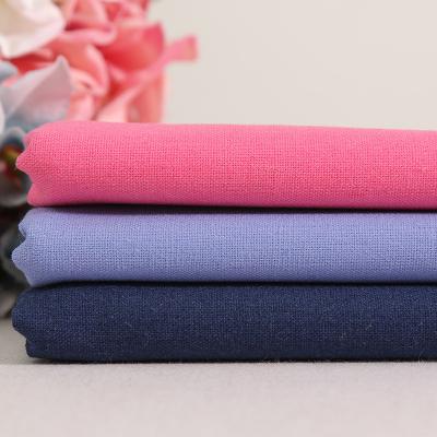 China 2022 fashion QUICK DRY solid color dyeing plain polyester canvas fabric for men and women dress suit pants tops for sale