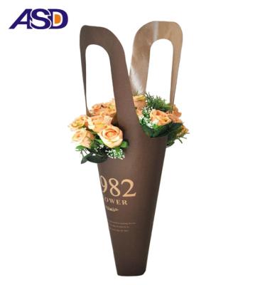 China Recycled Materials Fashion Kraft Paper Flower Carrier Fresh Flower Packaging Paper Carry Bags for sale